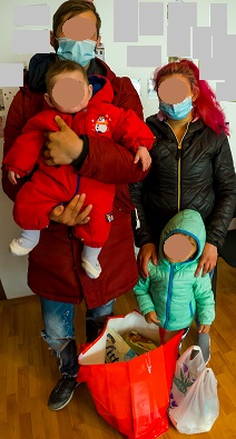 Family receiving Easter parcel